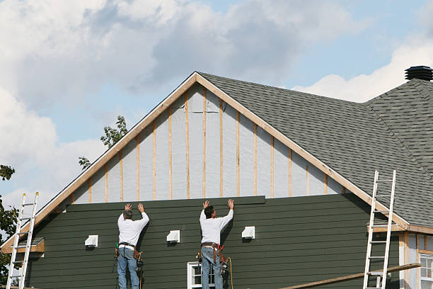 Professional Storm Damage Siding Repair technician working in Derwood, MD